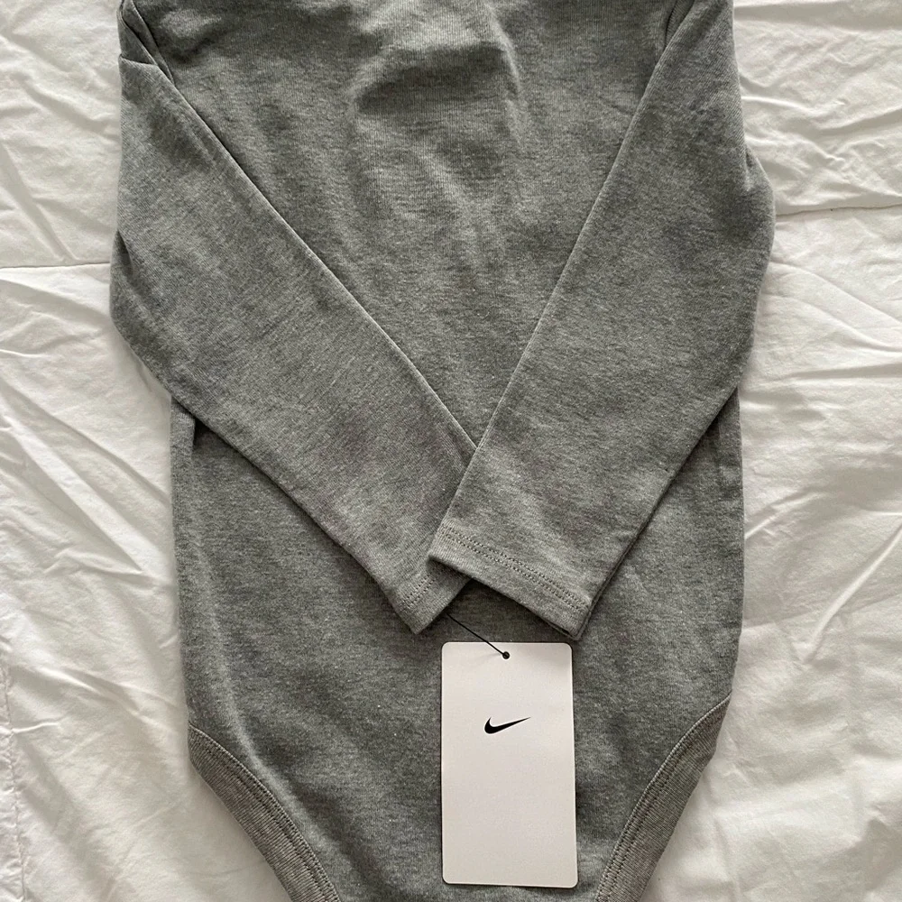 Nike Gray Long Sleeve Baby Onesie